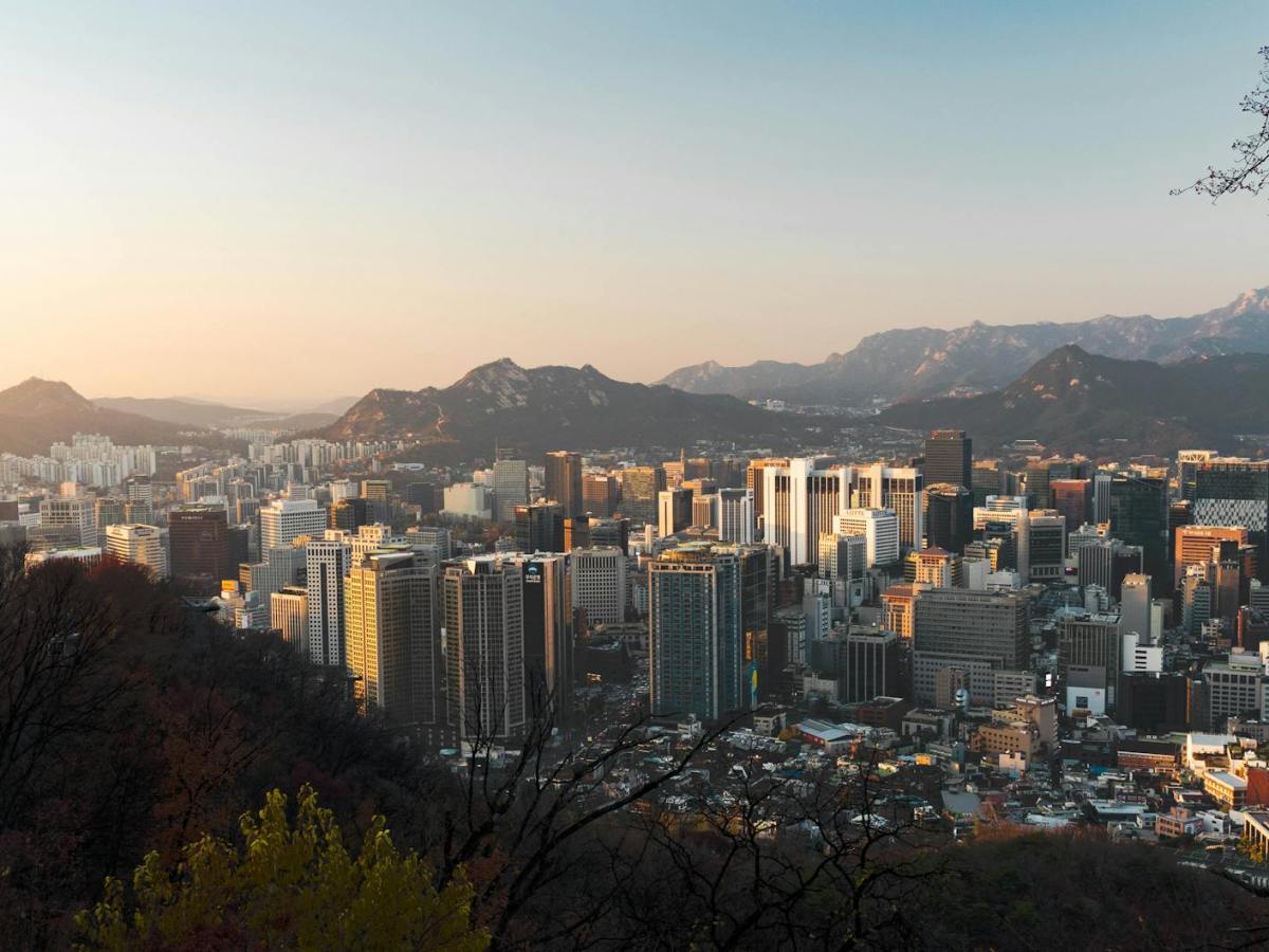 urban area surrounded by mountain range